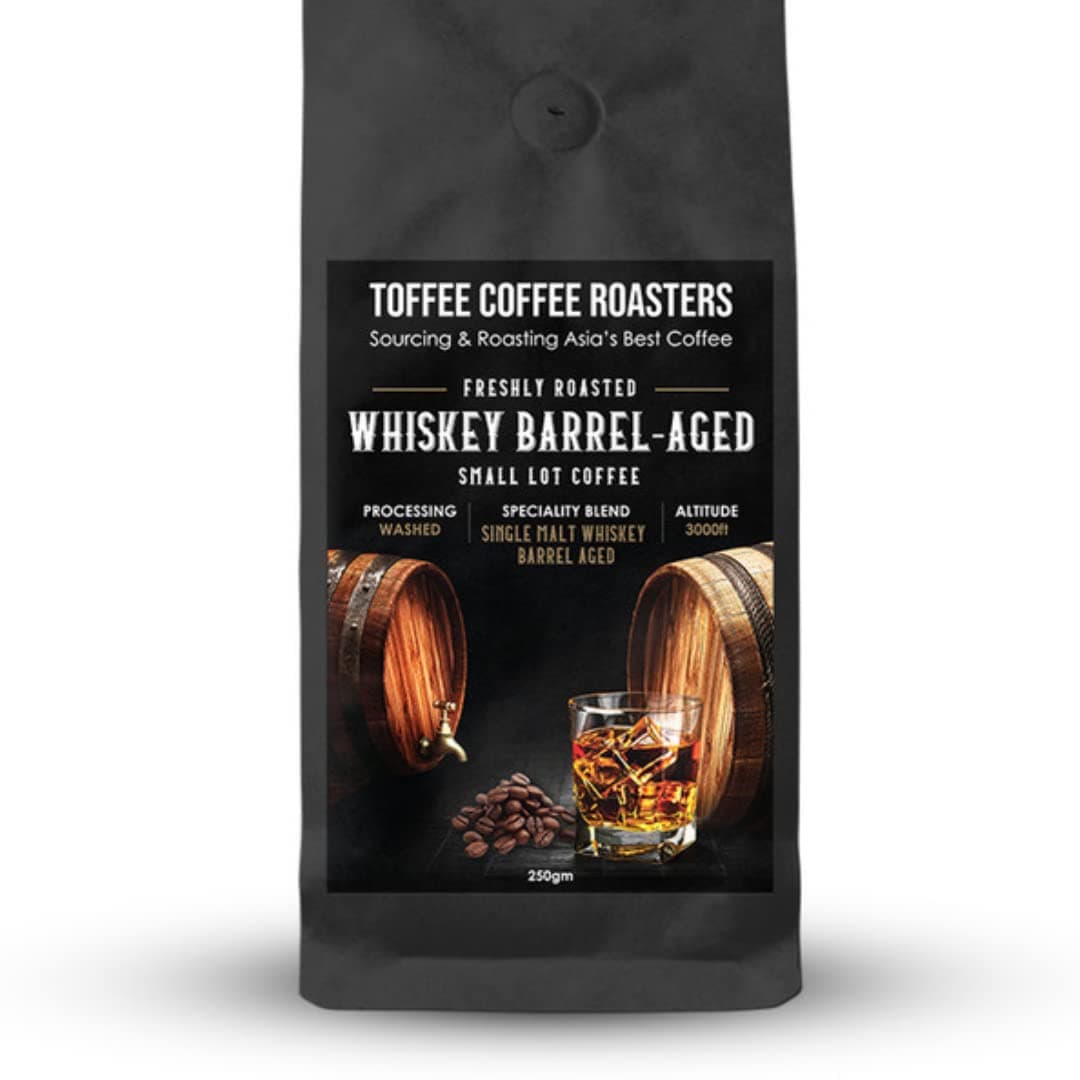 Single Malt Whiskey Barrel Aged Coffee | 100% Arabica | Medium Dark Roast | Grounded Coffee Notes: Fine Malt and Green Apple | Grind: Coffee Filter| Freshly Roasted | 250 gm