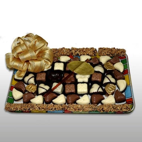 Glass Tray Filled with Chocolates and Honey