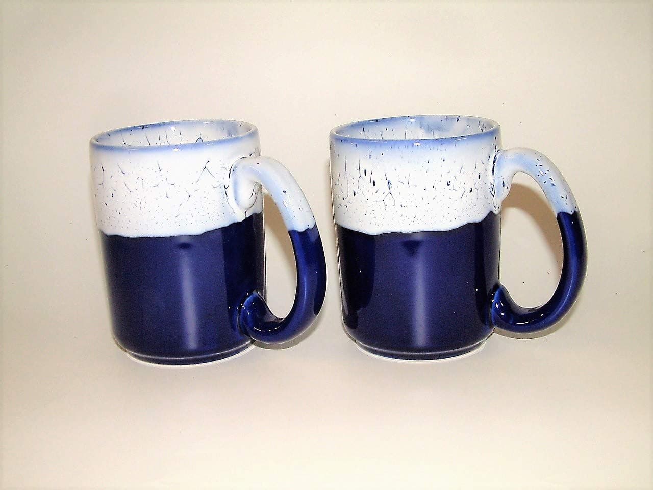 2 Large Mugs, 3/4 Pint,1/2 Litre Size. Hand Glazed in Cobalt Blue with White top.