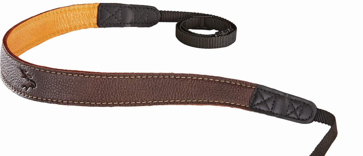 Eddycam 3506 Elk Leather Camera Strap 35 mm Wide Brown Mustang/Natural Contrast Stitching Ergonomically shaped camera strap for system cameras. Very slim deliberately without padding. Suitable for shoulder, neck or diagonal wear. Very comfortable to wear up to 1.2 kg. Made in Germany