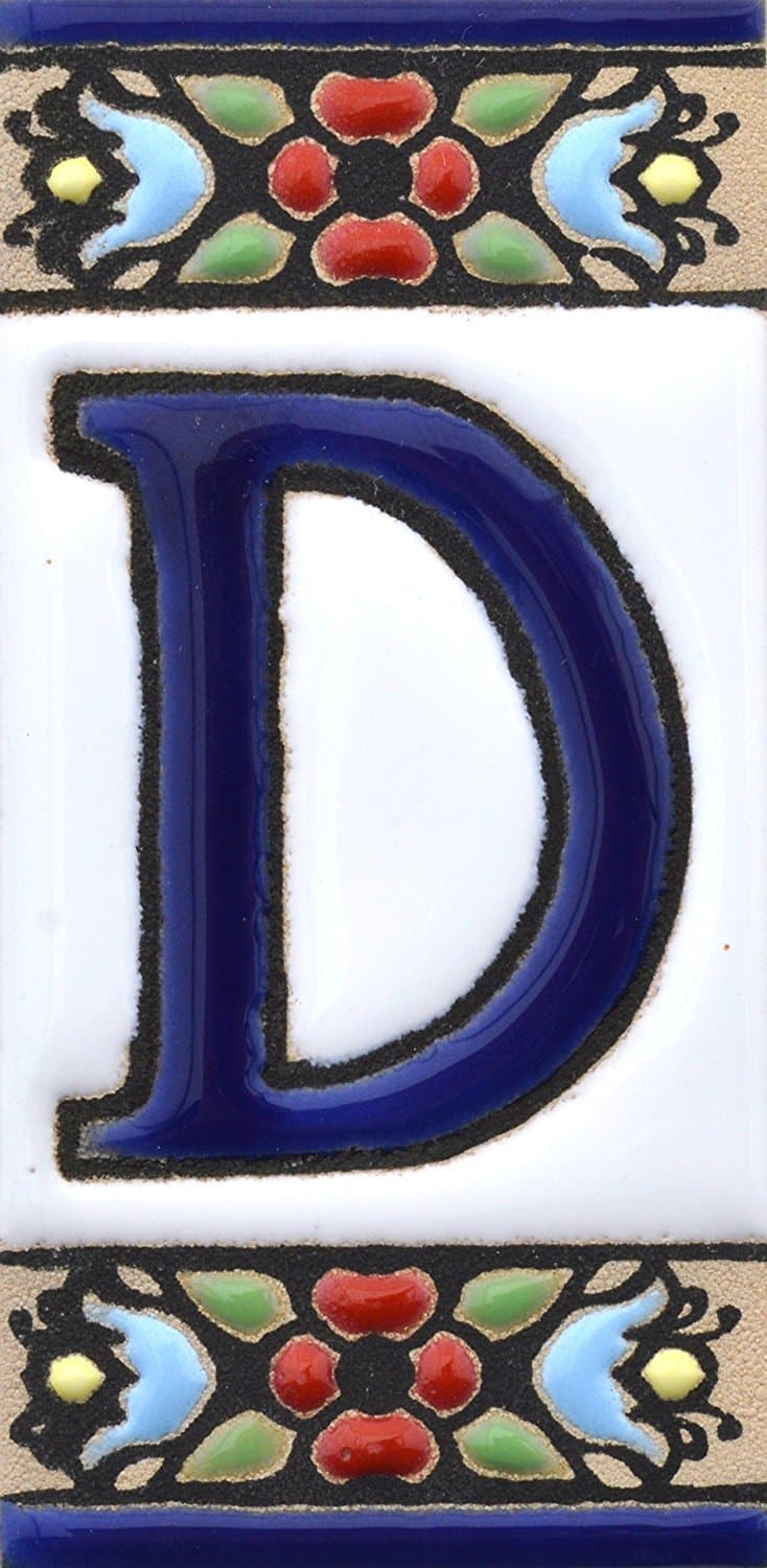 Spanish, Hand painted polichrome ceramic tiles. letters and numbers handpainted using dry rope technique perfect to create signs,addresses and names. Design FLORES MINI (LETTER D)