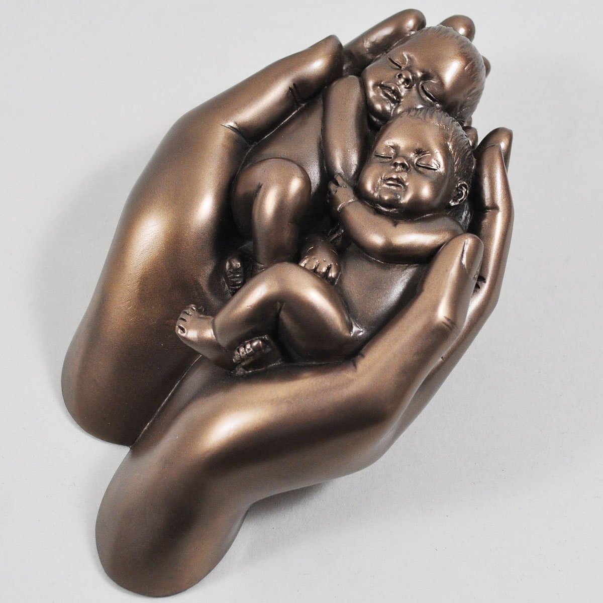 Cold Cast Bronze Twin babies in hands