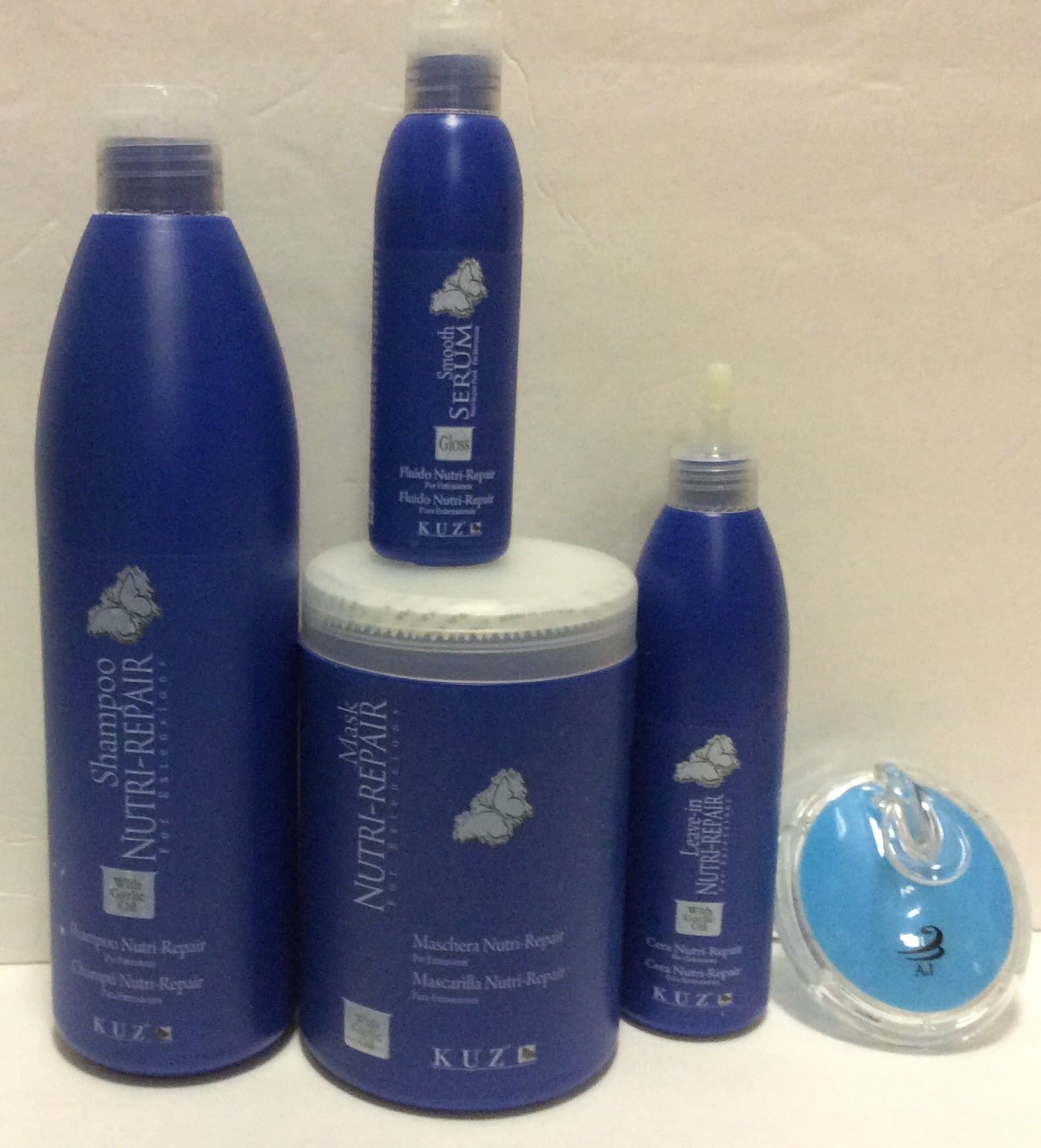 Kuz Nutri-repair Kit with Garlic Oil, Shampoo 33.8 Oz, Mask 33.8 Oz, Leave-in 10.14 Oz, Serum Gloss 5.28 Oz and Aj Professional Shampoo Brush Bundle.