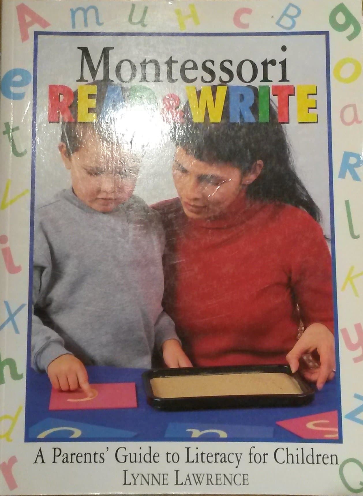 Montessori Read & Write: A parent's guide to literacy for children Paperback – 6 Aug. 1998