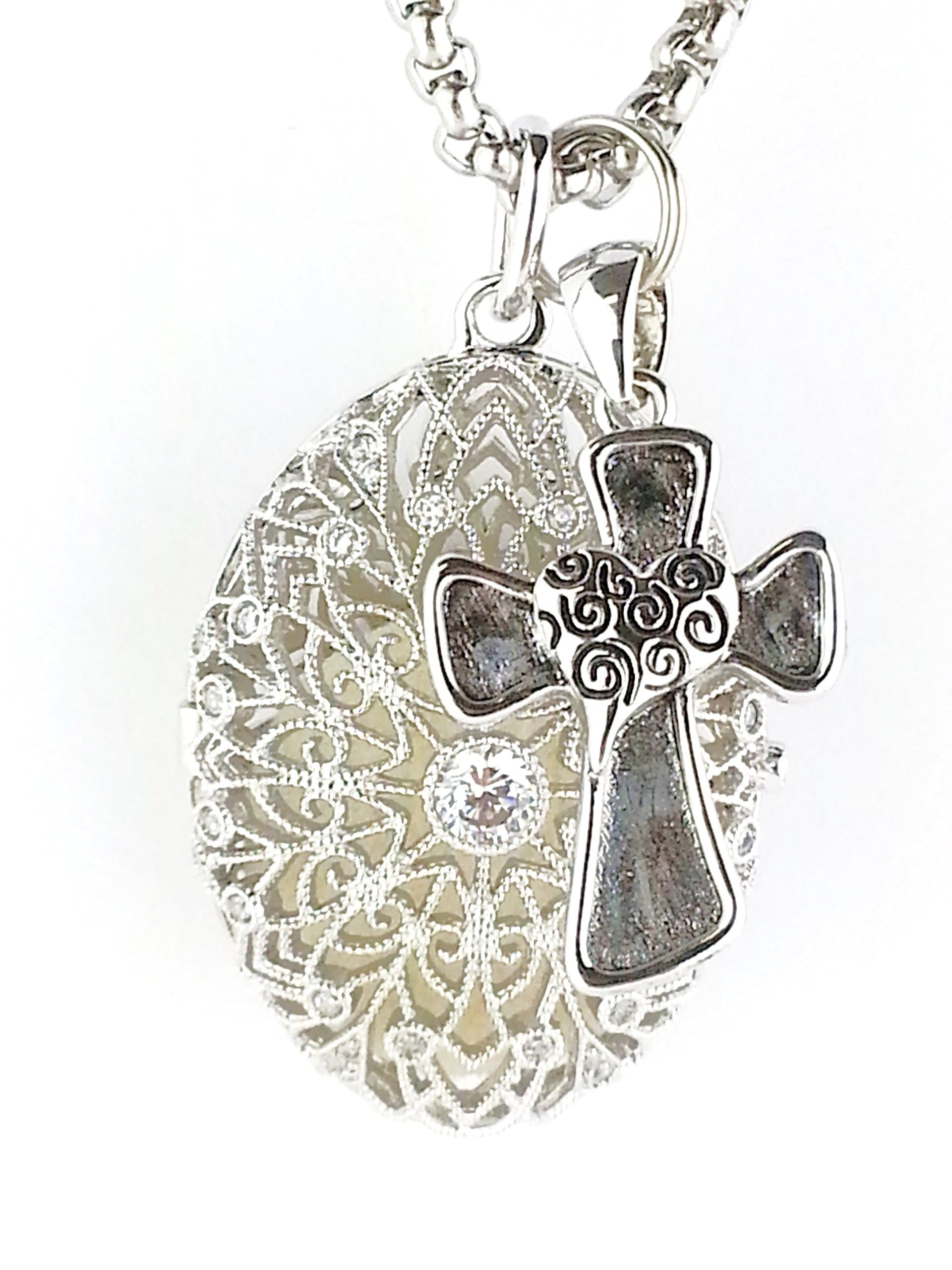 Filigree Oval Essential Oil Diffuser Necklace, Sterling Silver/Rhodium Plated with"Cross" Charm, 18 inch Chain, and 3 Felt Pads Included.