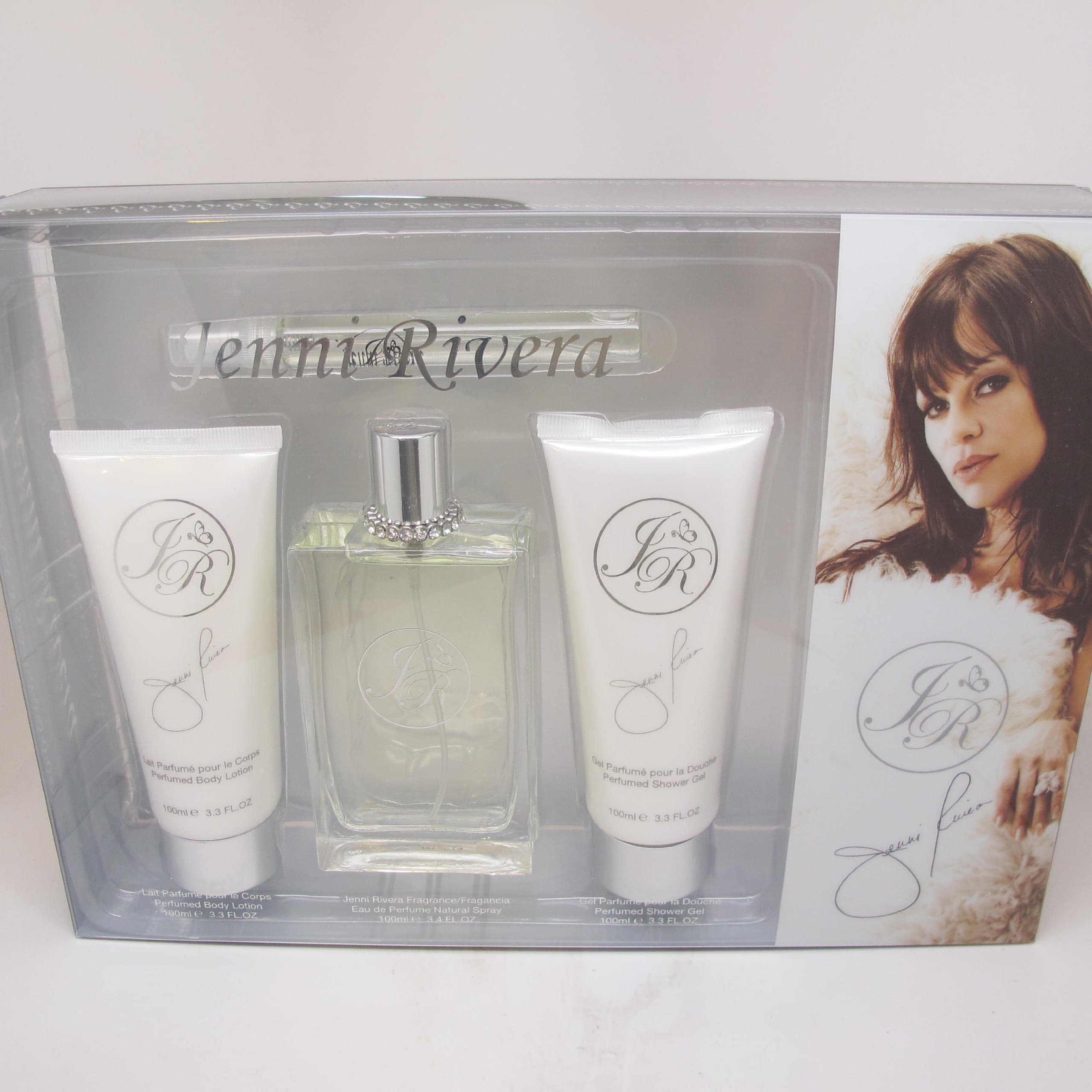 JR By Jenni Rivera for Women 4 Piece Set: 3.4 Oz Eau De Perfume Spray + 3.3 Oz Perfumed Body Lotion + 3.3 Oz Perfumed Shower Gel