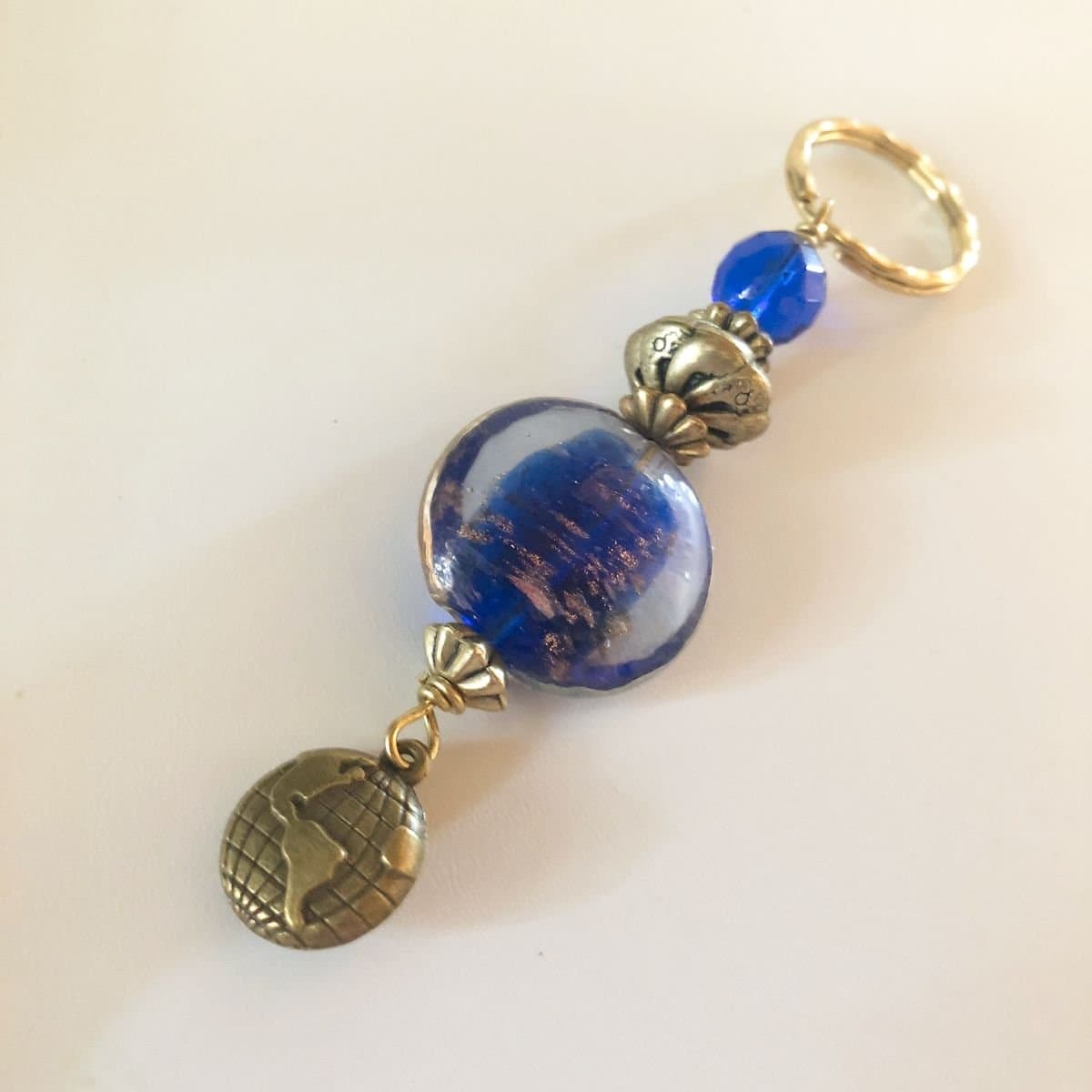 Charm Key Chain, Key Ring, Key Fob - Round Cobalt Lampwork & Crystal Faceted Beads - Gold Hammered Ring - World Map Charm - Gold Accents